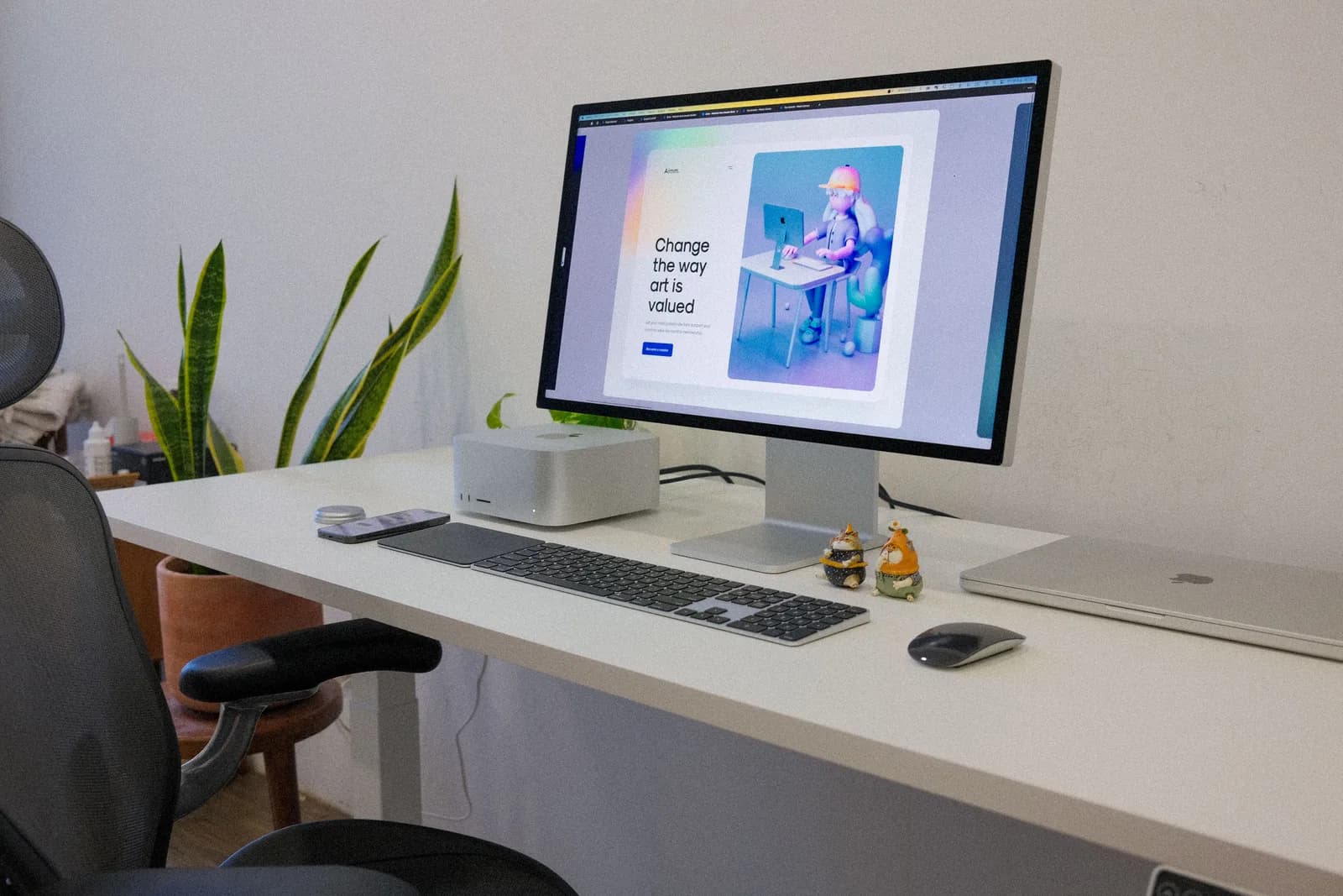 A calm, tidy desk with a closed-down Mac, suggesting the fans have gone quiet