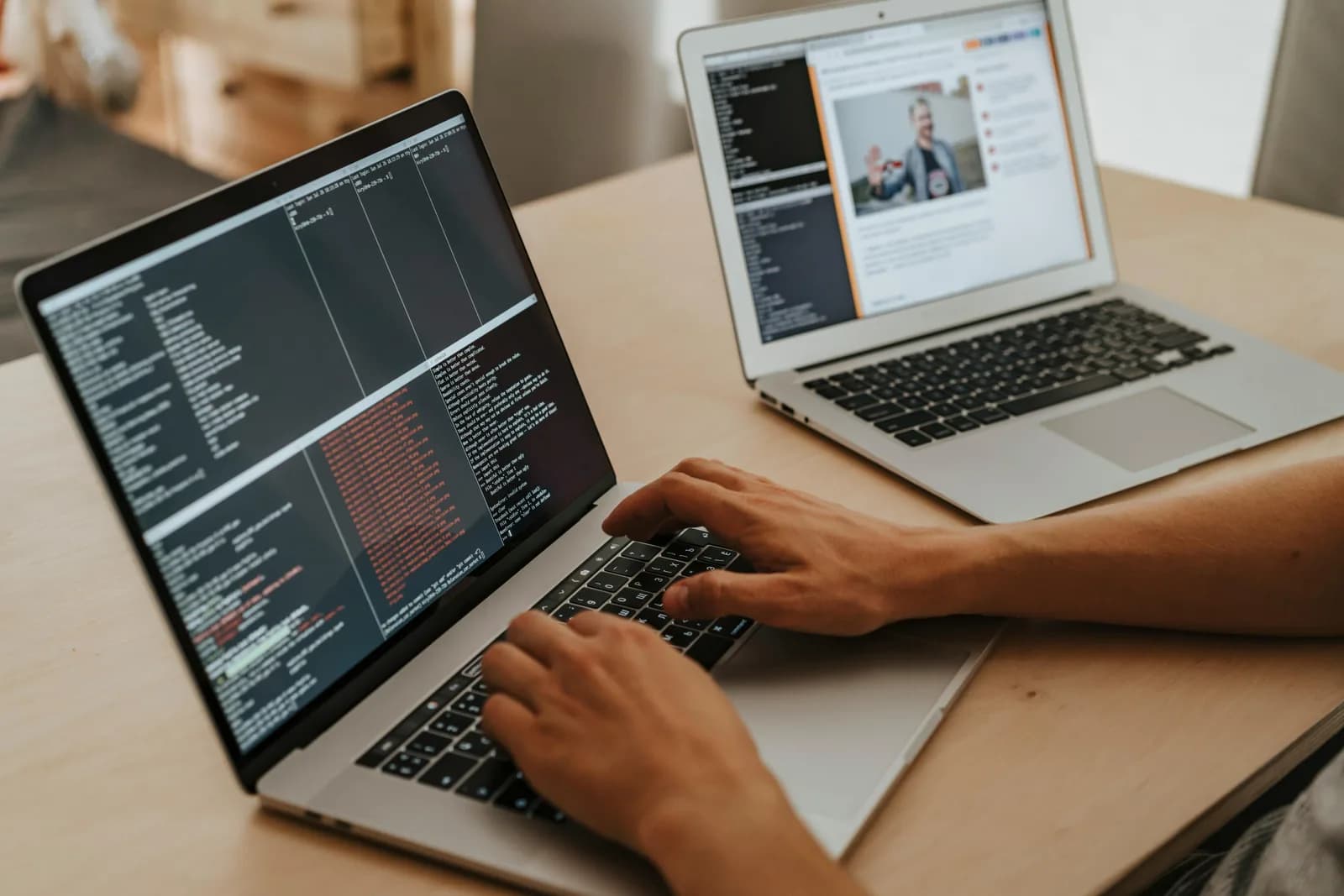 Developer at a desk with a laptop and an issue board on screen, evoking fast task capture