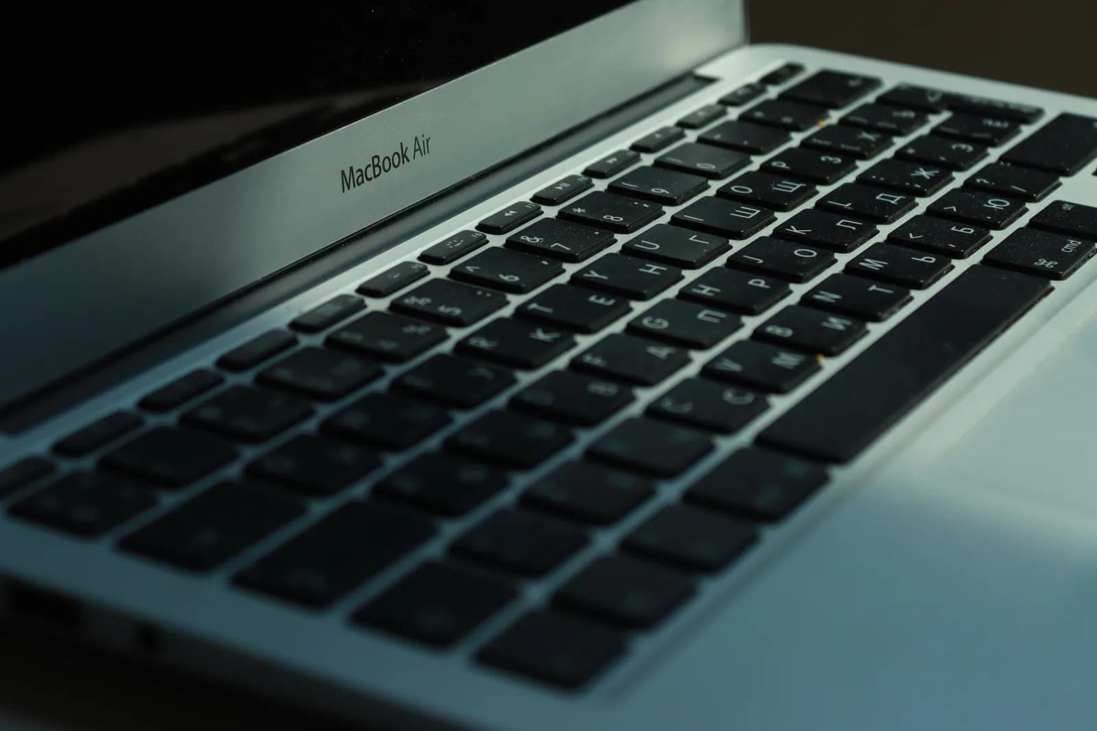 Close-up of a Mac keyboard, with the function row where the Microphone key lives