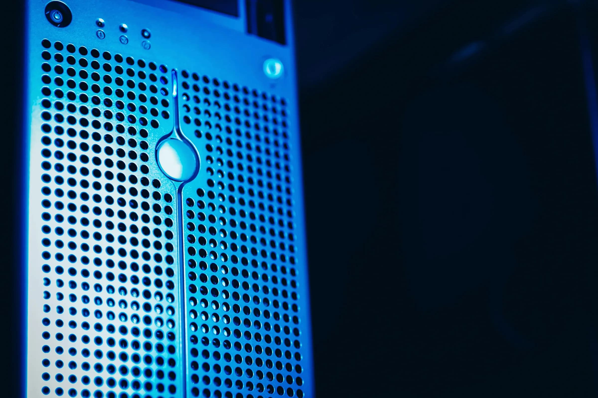 Server rack glowing blue in a data center, the cloud infrastructure offline dictation keeps your audio away from