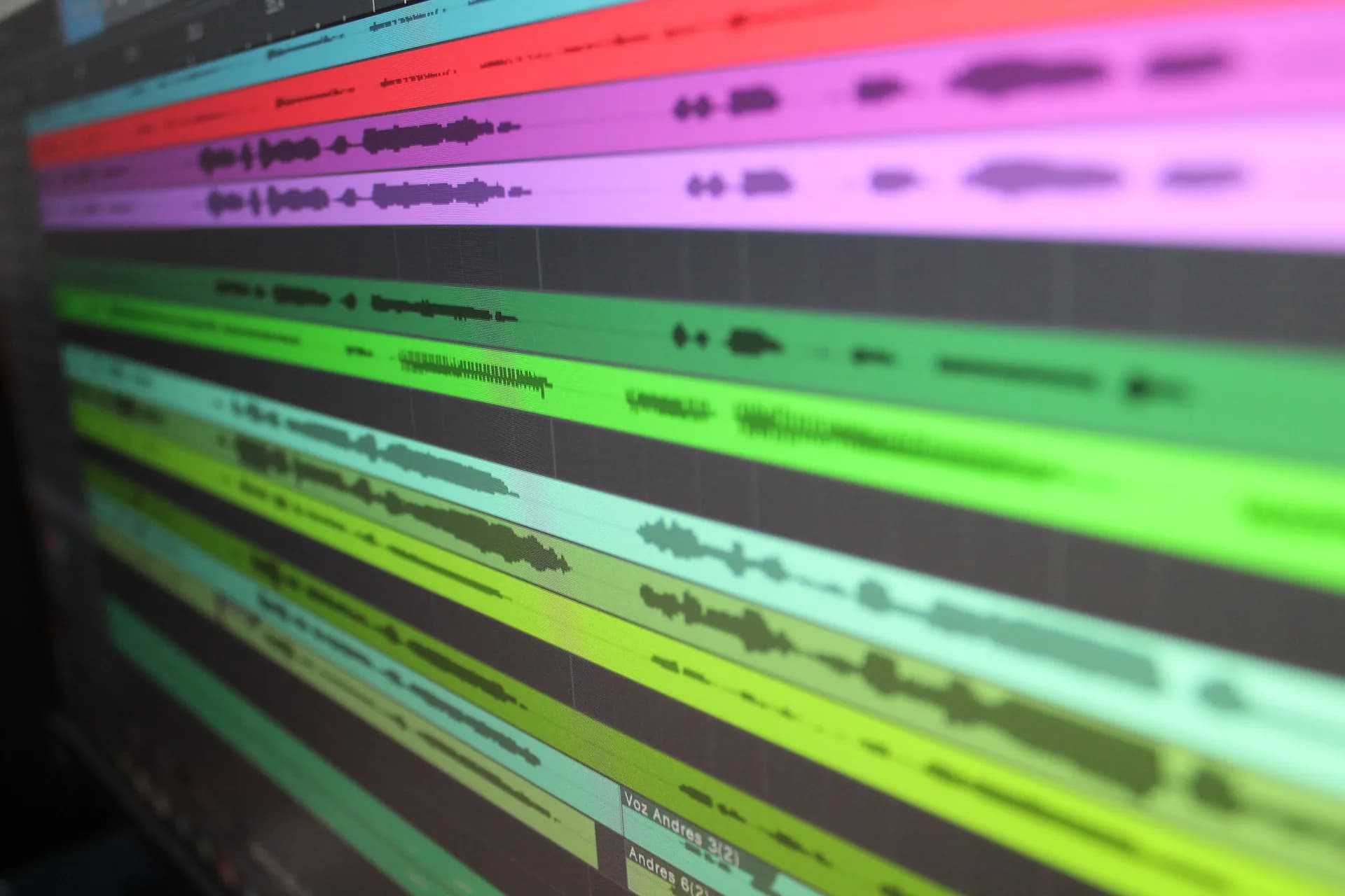 Audio waveforms displayed on a computer screen, illustrating transcription and audio editing software