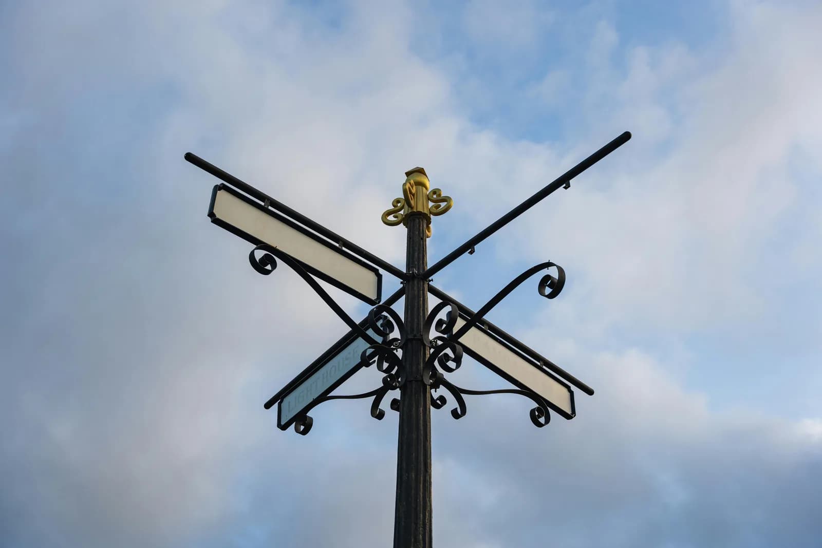 Two signposts pointing in different directions, illustrating a choice between tools