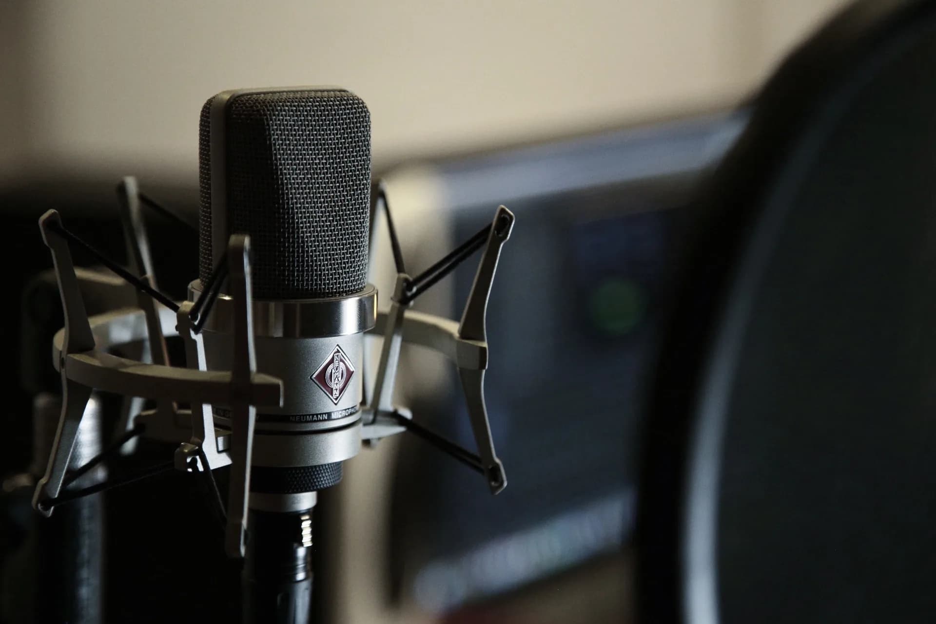 Close-up of a studio condenser microphone, framing a discussion of why voice dictation misfires
