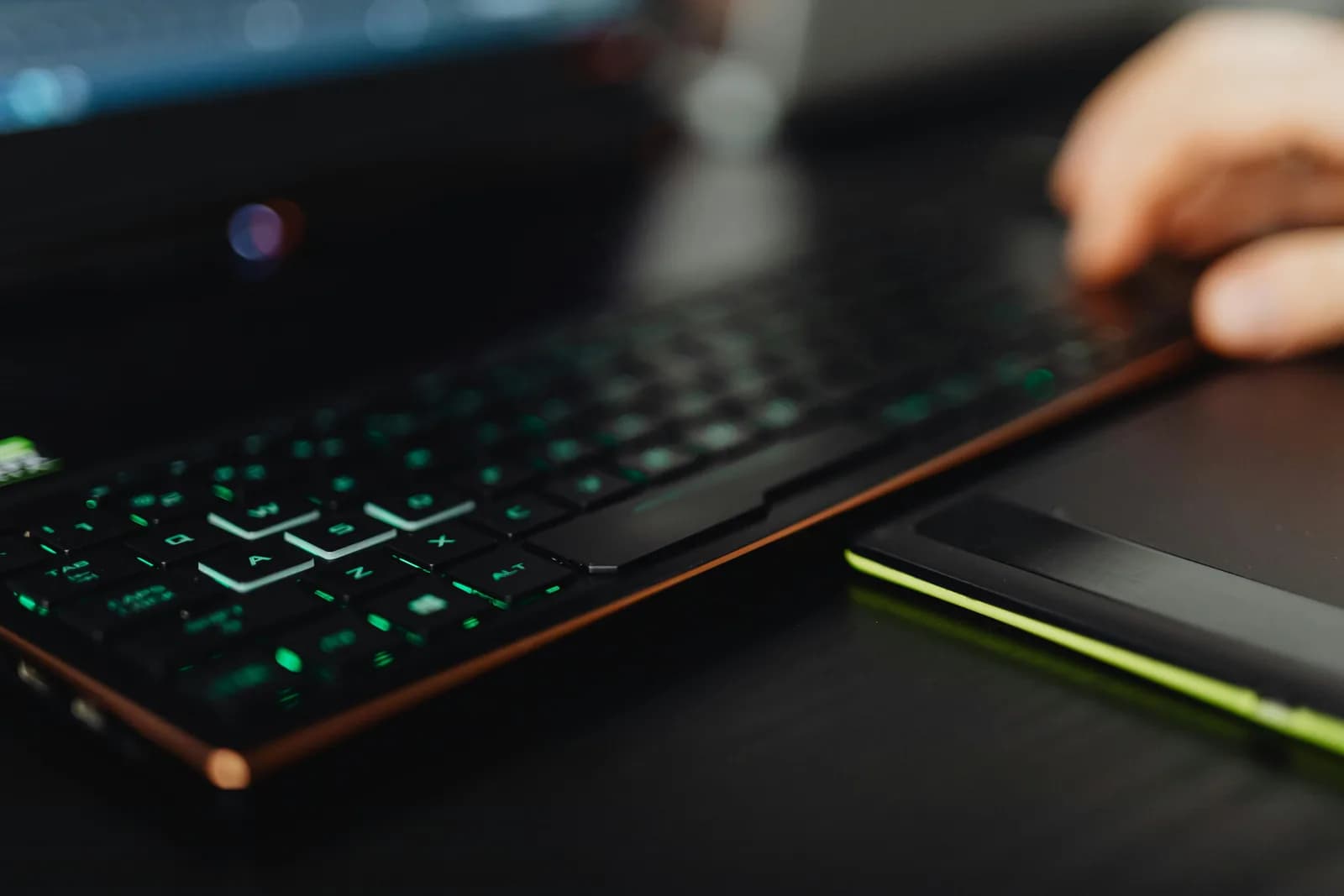 A stopwatch beside a keyboard on a dark desk, illustrating a feature that times out