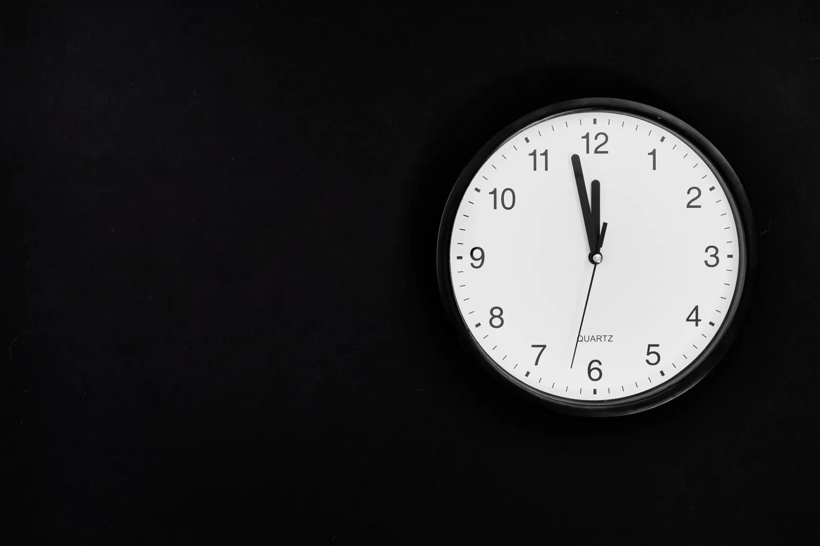 Old-fashioned alarm clock on a desk, representing an over-eager stop timer