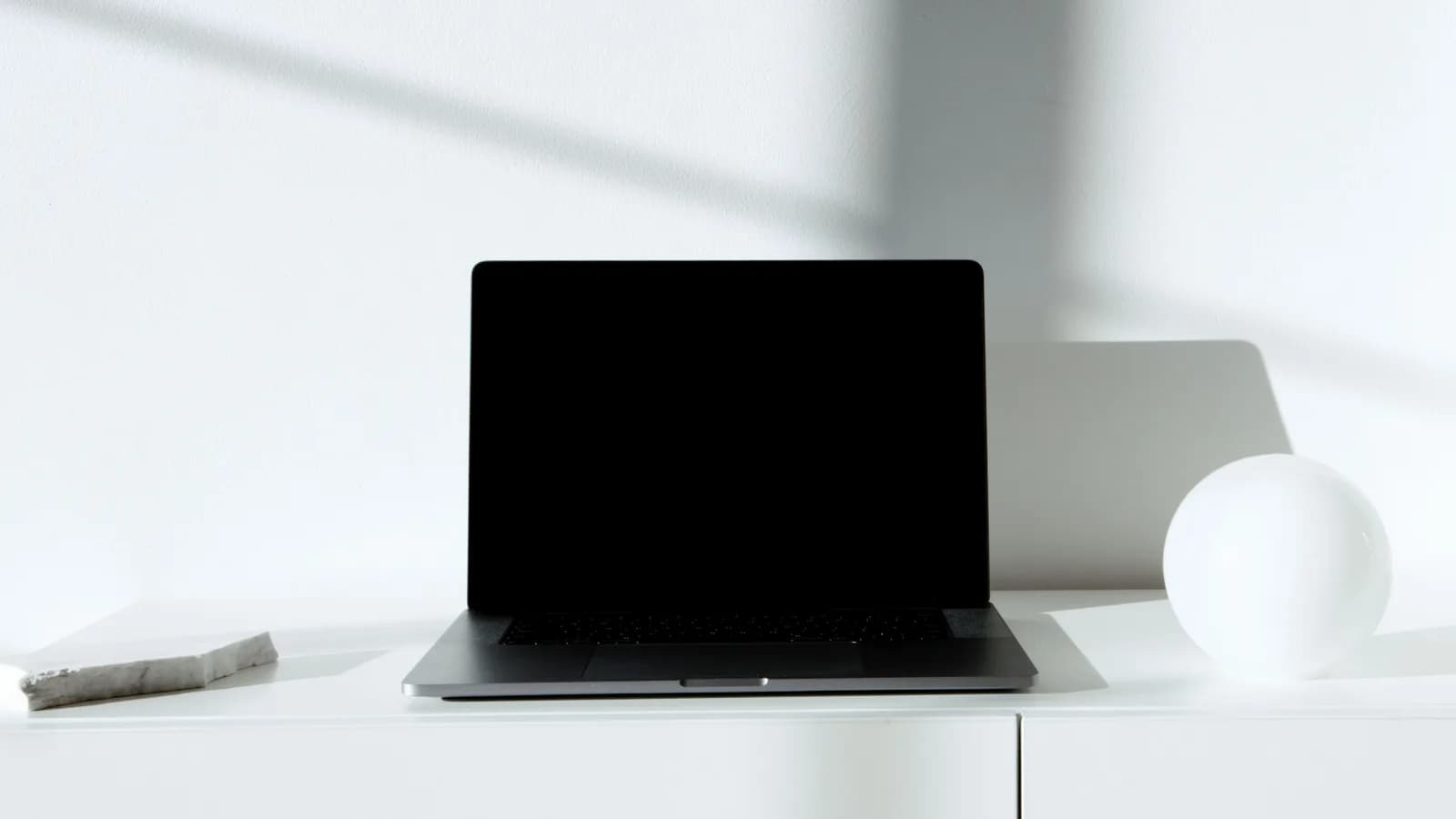 Minimalist laptop on a clean desk for light quick tasks