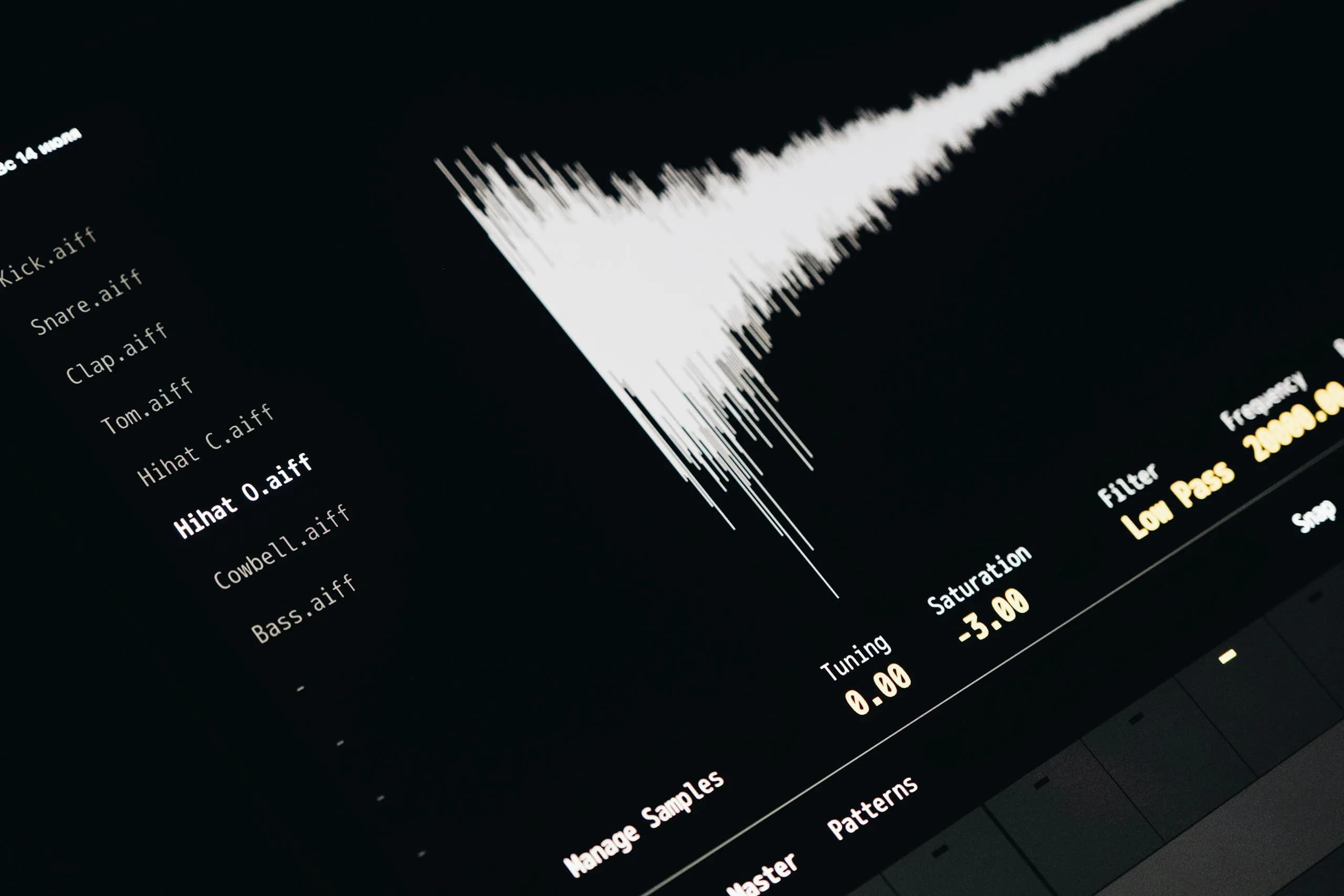 Audio waveform on a screen with sound file names, evoking text-to-speech rendering and audio output