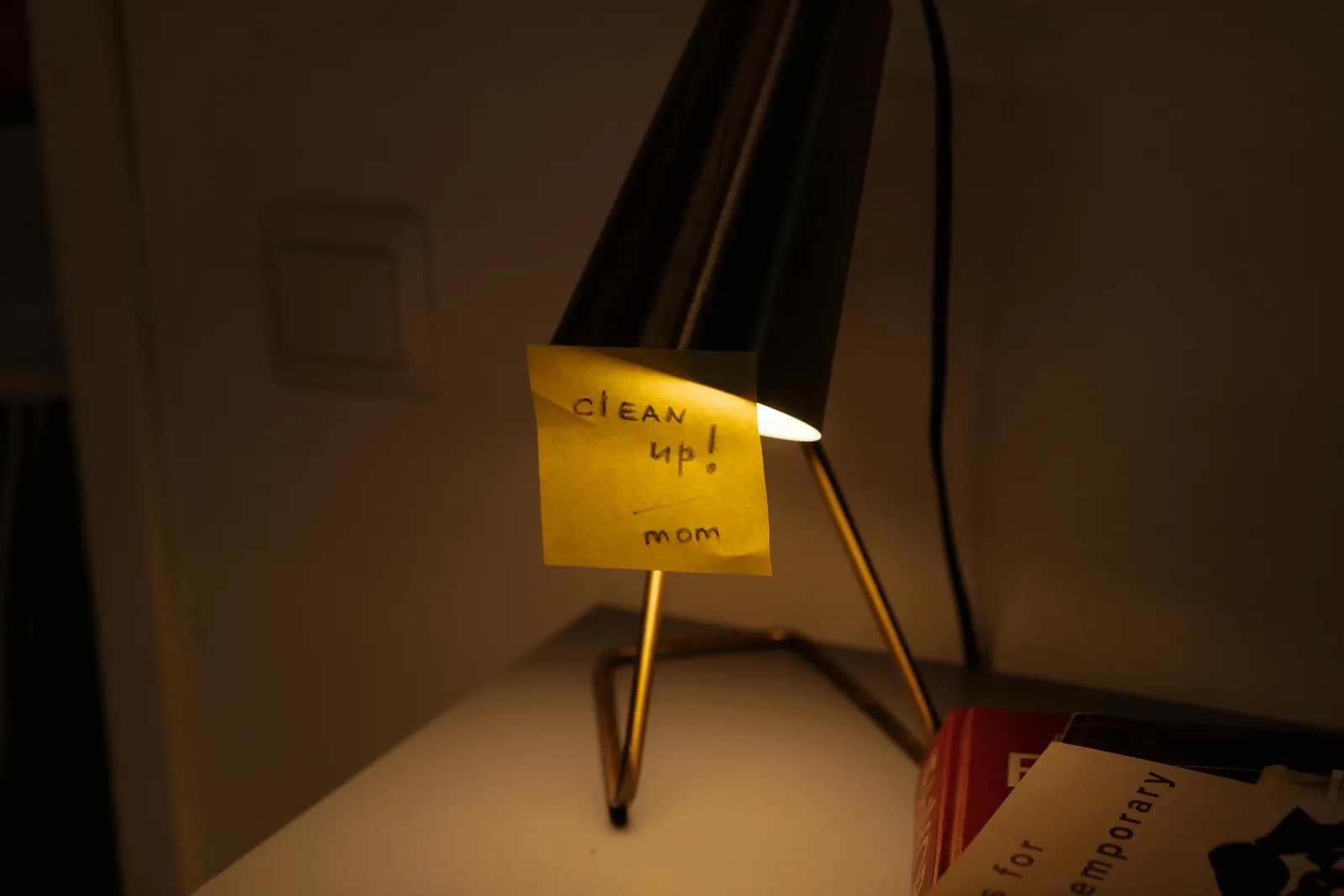 A single sticky note on a clean desk, suggesting a small, sufficient solution