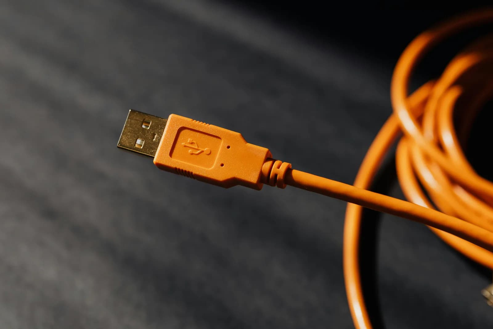 Macro shot of a USB cable connector, the kind that links a mic to a PC