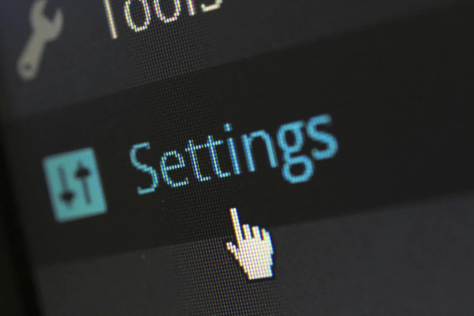 Close-up of a screen with a settings control and cursor hovering over it