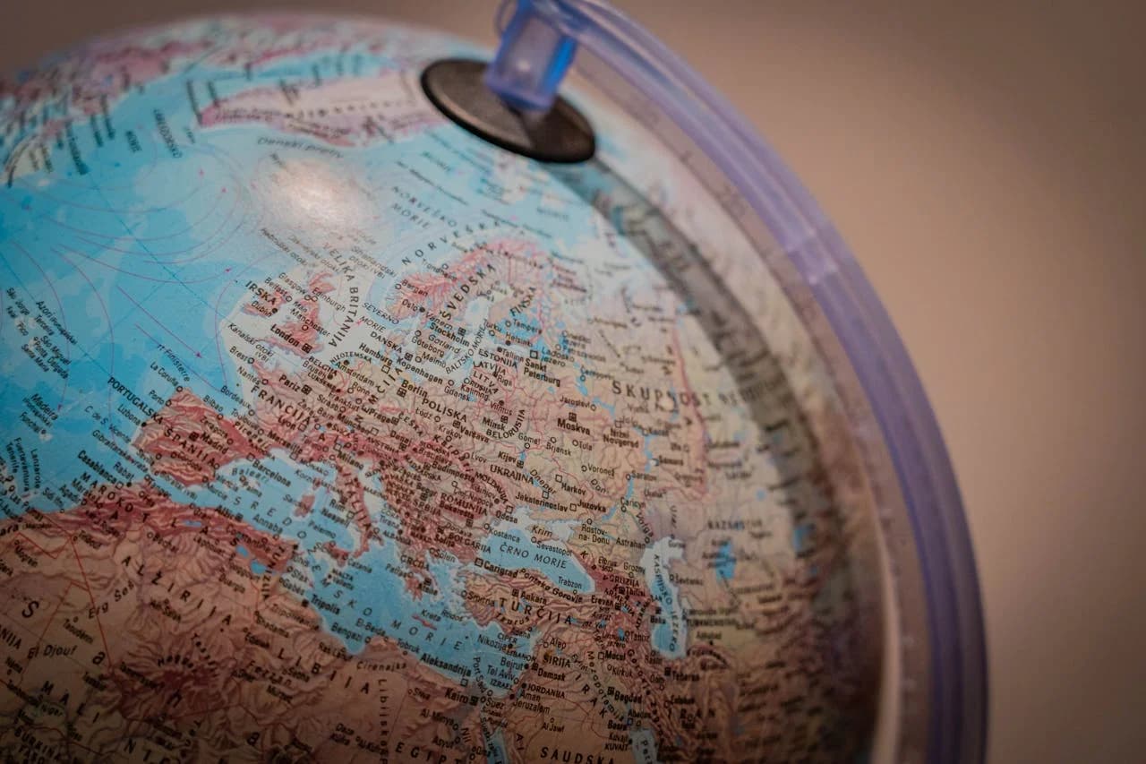 Close-up of a world globe showing European countries, used to evoke multilingual dictation